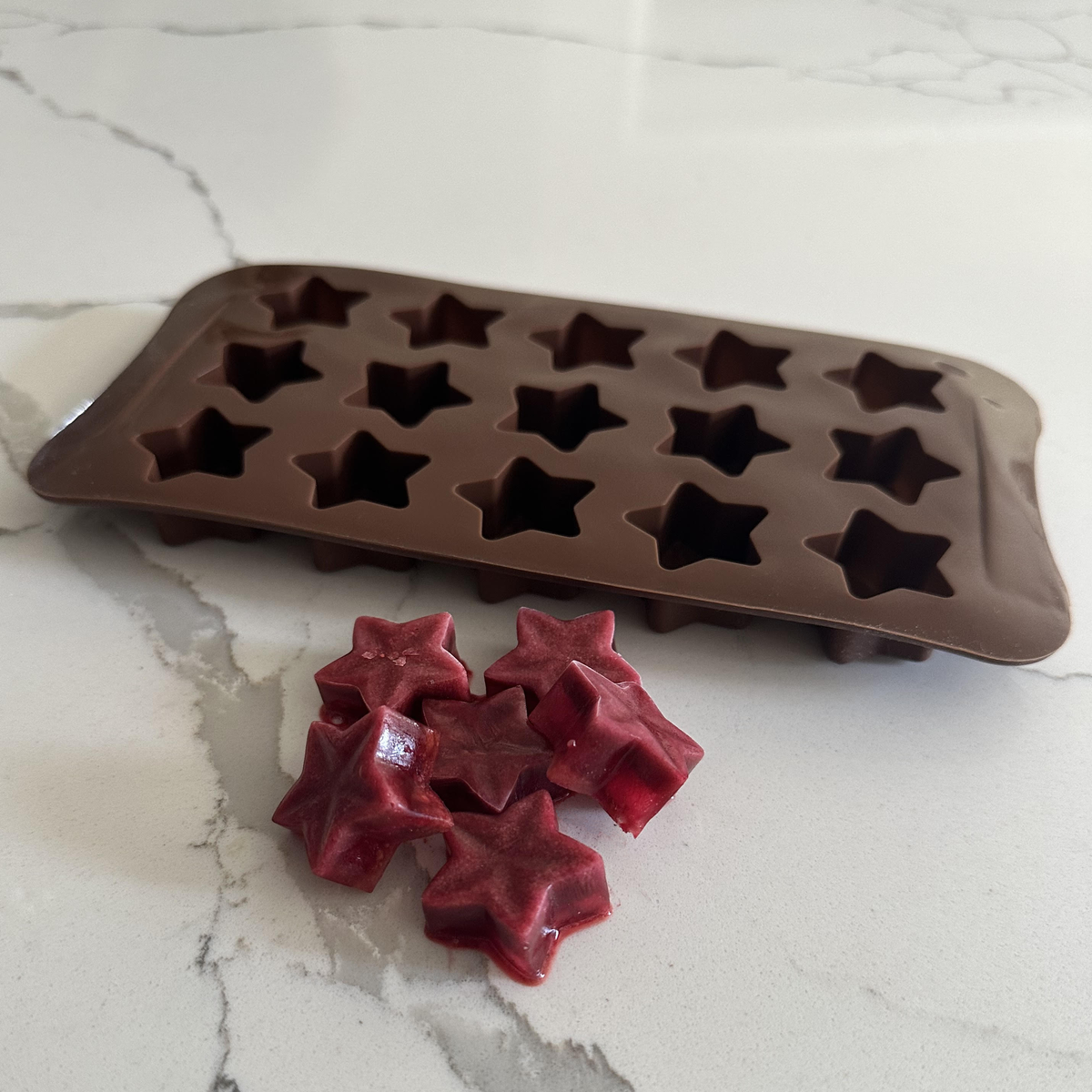 star shaped ice cube mold with treats